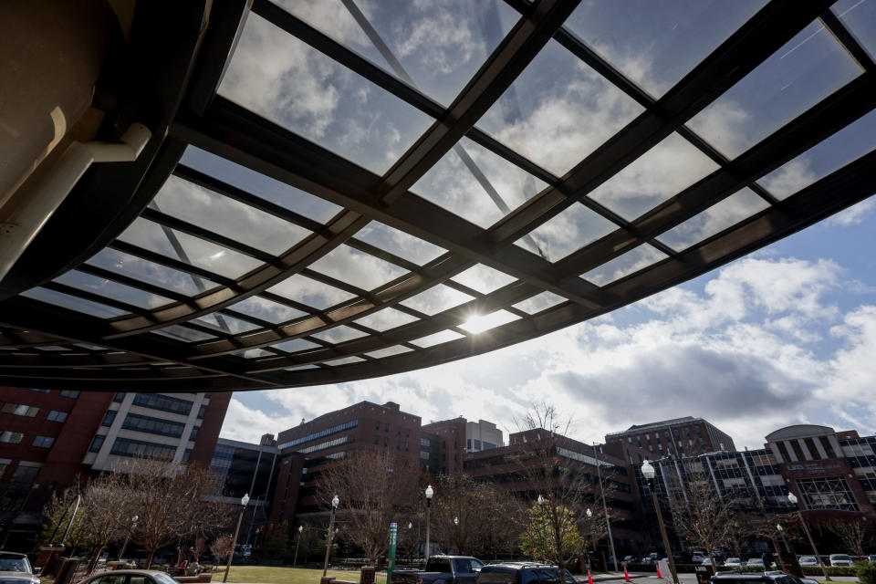 The sun shines through an awning at The University of Alabama at Birmingham Women's and Infant Center in Birmingham, Ala., on Wednesday, March 23, 2022. (AP Photo/Butch Dill)