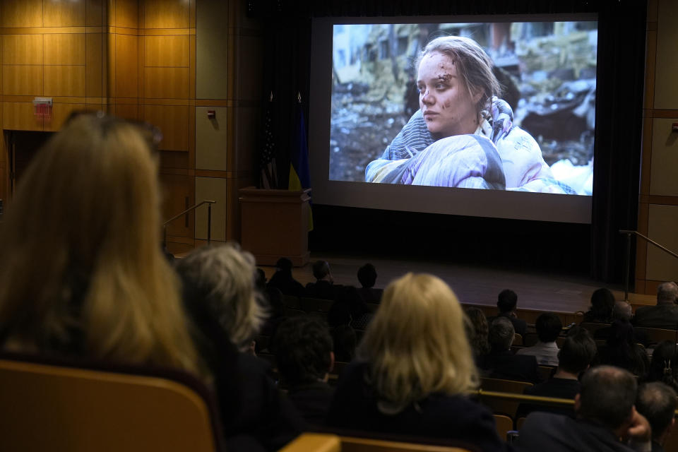 People watch a screening of "20 Days in Mariupol" at the State Department in Washington, Tuesday, Feb. 27, 2024. (AP Photo/Susan Walsh)