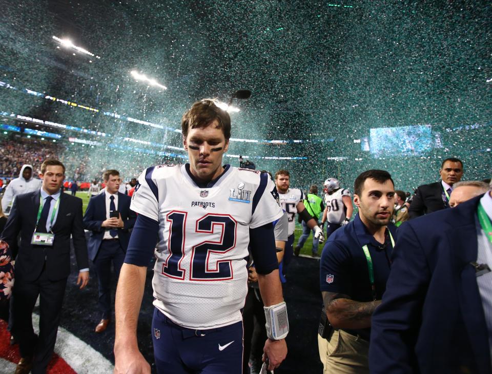 <p>New England Patriots quarterback Tom Brady (12) walks off the field after Super Bowl LII against the Philadelphia Eagles at U.S. Bank Stadium. Mandatory Credit: Mark J. Rebilas-USA TODAY Sports </p>
