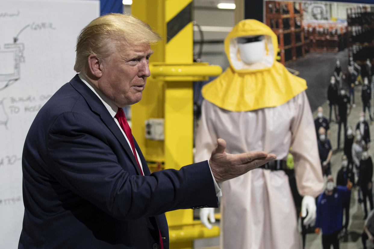 President Donald Trump speaks as he tours Ford's Rawsonville Components Plant that has been converted to making personal protection and medical equipment, Thursday, May 21, 2020, in Ypsilanti, Mich. (AP Photo/Alex Brandon)