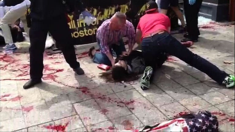 A video grab shows the victims of one of the blasts at the finish line of the Boston Marathon on April, 15, 2013. Two bomb blasts struck one of America's top sporting events Monday, killing at least three and wounding more than 100 as the Boston Marathon erupted in a maelstrom of blood, screams, smoke and panic