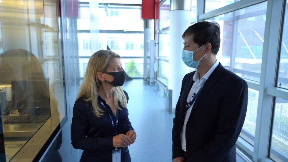 Image: Janis Mackey Frayer tours the Wuhan Institute of Virology with Dr. Yuan Zhiming, Director of Wuhan National Biosafety Laboratory. (NBC News)