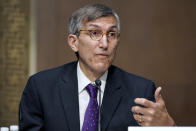 FILE - In this Tuesday, May 11, 2021 file photo, Dr. Peter Marks, director of the Center for Biologics Evaluation and Research in the Food and Drug Administration, testifies during a Senate health, education, labor, and pensions hearing to examine an update from federal officials on efforts to combat COVID-19 on Capitol Hill in Washington. On Friday, Sept. 10, 2021, Marks urged parents to be patient, saying the agency will rapidly evaluate vaccines for 5- to 11-year-olds as soon as it gets the needed data. (Jim Lo Scalzo/Pool via AP)