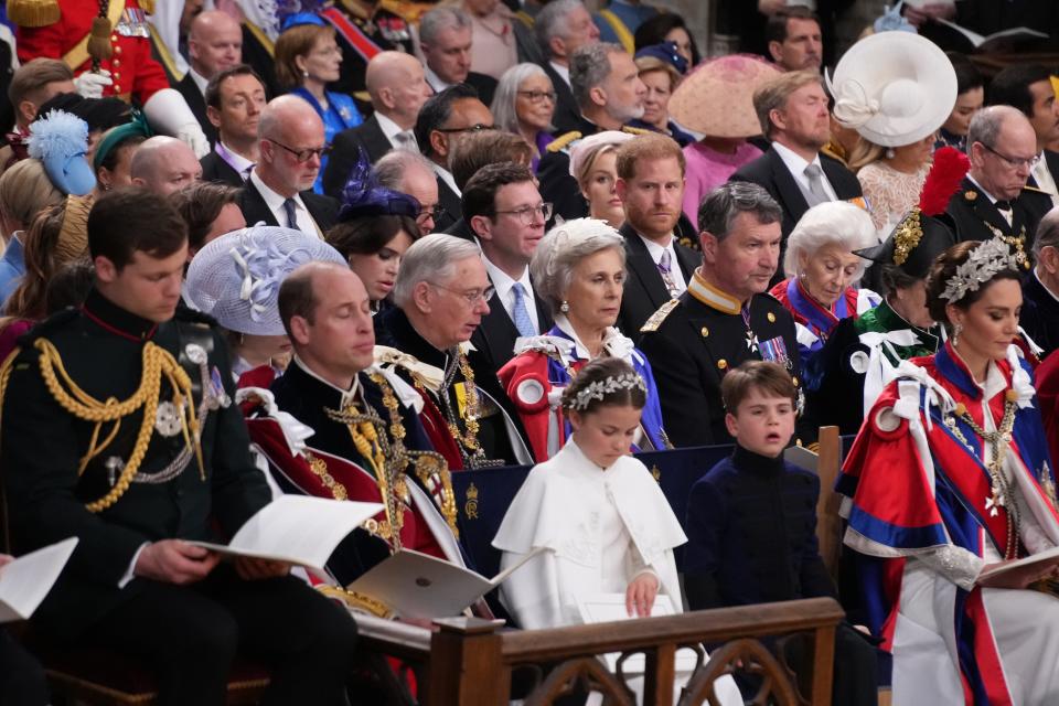 Prince Harry sat in the pew behind Prince William's, on the opposite end.