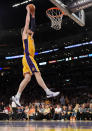 LOS ANGELES, CA - MAY 12: Pau Gasol #16 of the Los Angeles Lakers goes up for an uncontested dunk in the second quarter against the Denver Nuggets in Game Seven of the Western Conference Quarterfinals in the 2012 NBA Playoffs on May 12, 2012 at Staples Center in Los Angeles, California. NOTE TO USER: User expressly acknowledges and agrees that, by downloading and or using this photograph, User is consenting to the terms and conditions of the Getty Images License Agreement. (Photo by Harry How/Getty Images)