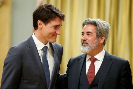 Canada's Prime Minister Justin Trudeau congratulates Pablo Rodriguez after he was sworn-in as Minister of Canadian Heritage and Multiculturalism during a cabinet shuffle at Rideau Hall in Ottawa, Ontario, Canada, July 18, 2018. REUTERS/Chris Wattie