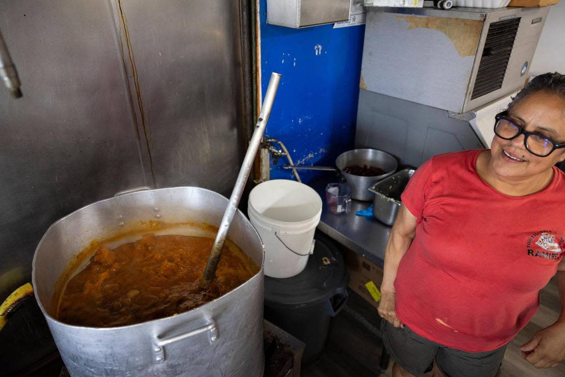 Laura Patricia Ramirez works in the kitchen of Tortilleria y Taqueria Ramirez in Cardinal Valley off of Alexandria Drive in Lexington, Ky., Friday, July 28, 2023.