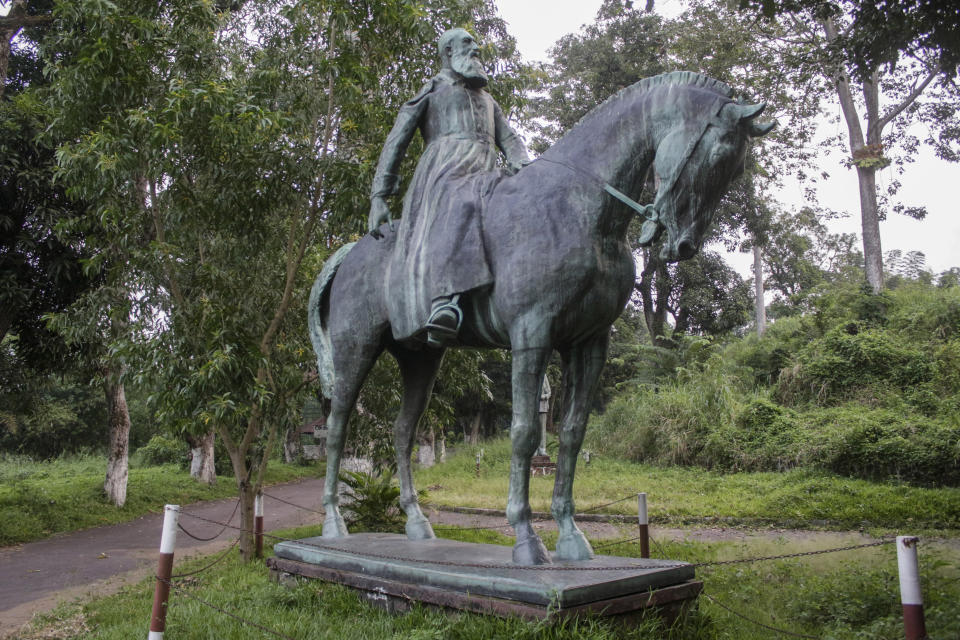 FILE - In this Wednesday, June 10, 2020 file photo, the last transmitted by AP contributing photographer John Bompengo, a statue of King Leopold II riding a horse is seen at the Institute of National Museums of Congo, in Kinshasa, Democratic Republic of Congo. Relatives say longtime Associated Press contributor John Bompengo has died of COVID-19 in Congo's capital. Bompengo, who had covered his country's political turmoil over the course of 16 years, died Saturday, June 20, 2020 at a Kinshasa hospital. (AP Photo/John Bompengo, file)