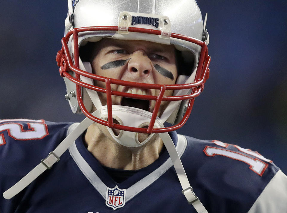 New England Patriots quarterback Tom Brady gets fired against the Ravens. (AP)
