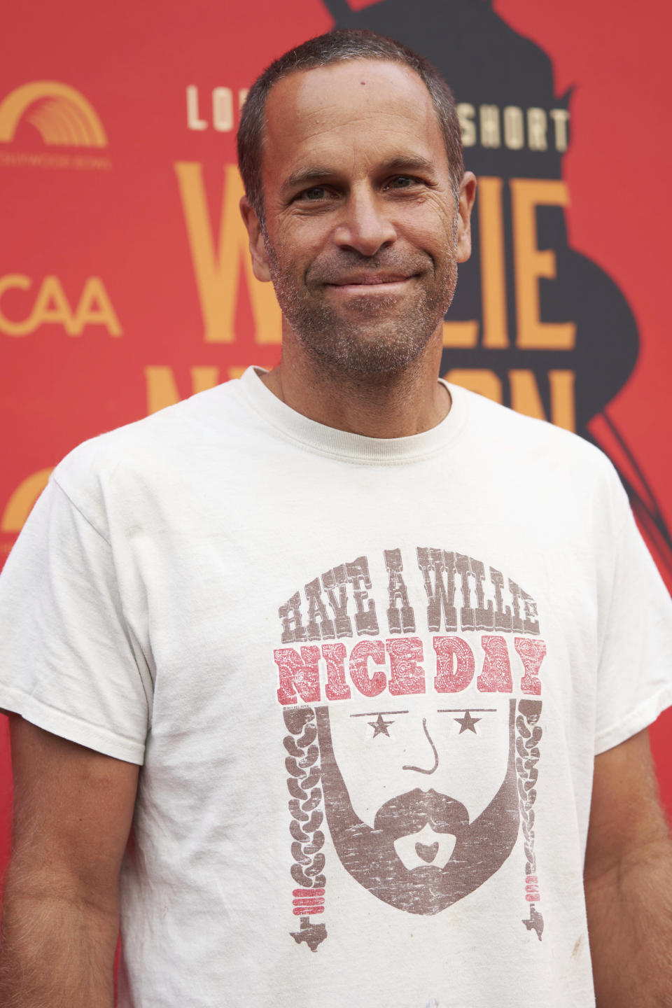 Jack Johnson arrives at Willie Nelson 90, celebrating the singer's 90th birthday on Saturday, April 29, 2023, at the Hollywood Bowl in Los Angeles. (Photo by Allison Dinner/Invision/AP)