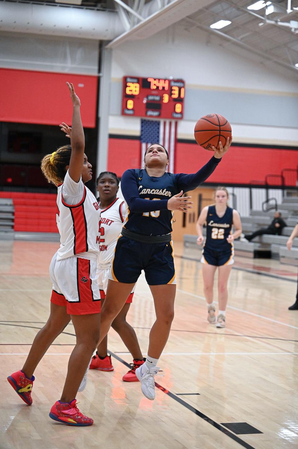 Lancaster junior Jenna Grabans shoots a lay up Friday night at Groveport. Grabans finished with 18 points and 14 rebounds as the Lady Gales fell in overtime 65-64.