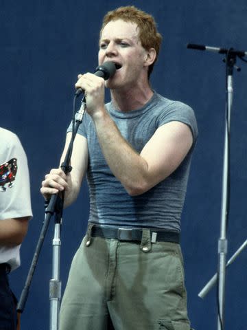 <p>Images Press/IMAGES/Getty</p> Danny Elfman of Oingo Boingo, circa 1983