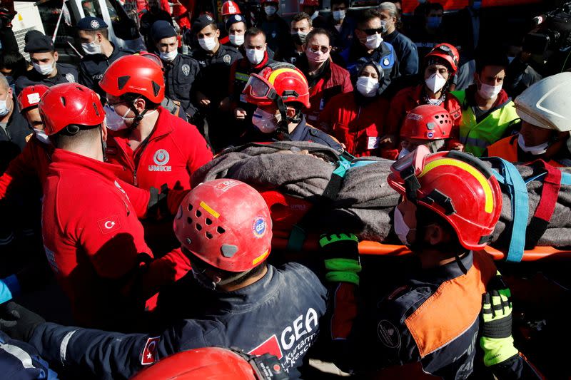 Rescue workers search for earthquake survivors in Izmir