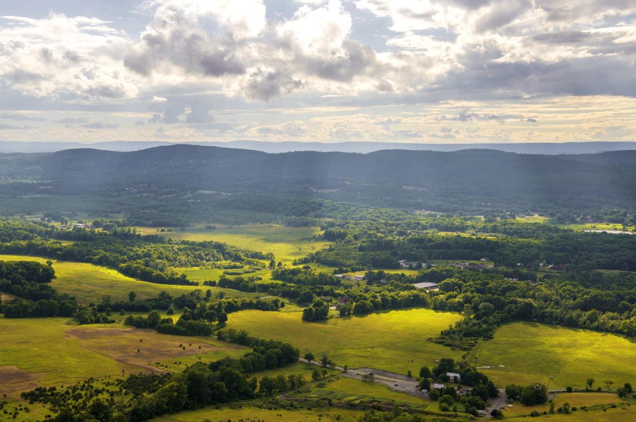 Sun rays over Vernon, New Jersey landscape viewed from Pinwheel Vista