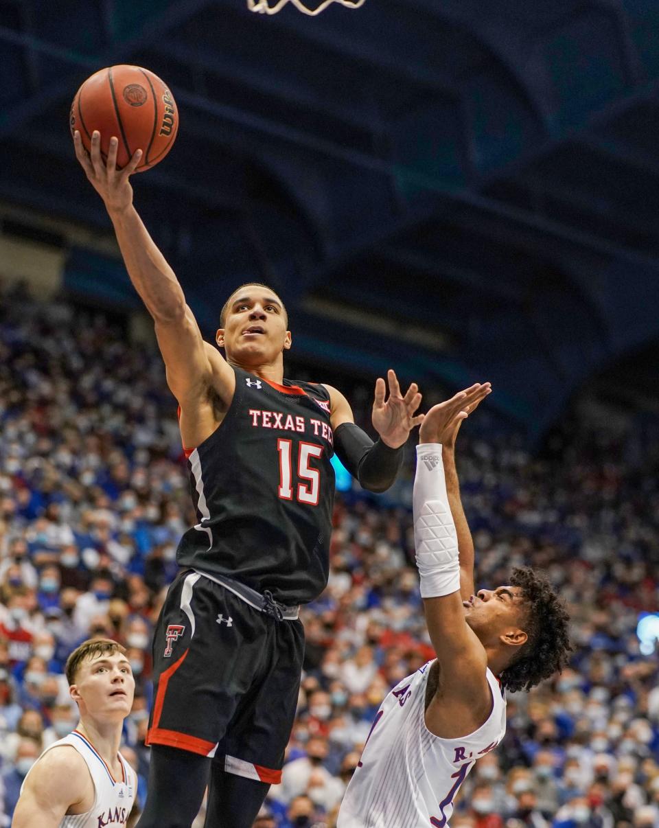 Kevin McCullar, then with Texas Tech, goes up for a layup during a game against Kansas on Jan. 24 at Allen Fieldhouse.