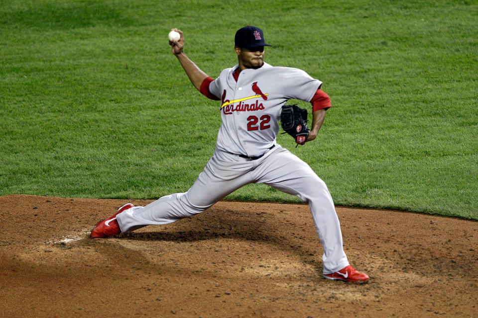 ARLINGTON, TX - OCTOBER 23: Edwin Jackson #22 of the St. Louis Cardinals pitches in the fifth inning during Game Four of the MLB World Series against the Texas Rangers at Rangers Ballpark in Arlington on October 23, 2011 in Arlington, Texas. (Photo by Rob Carr/Getty Images)