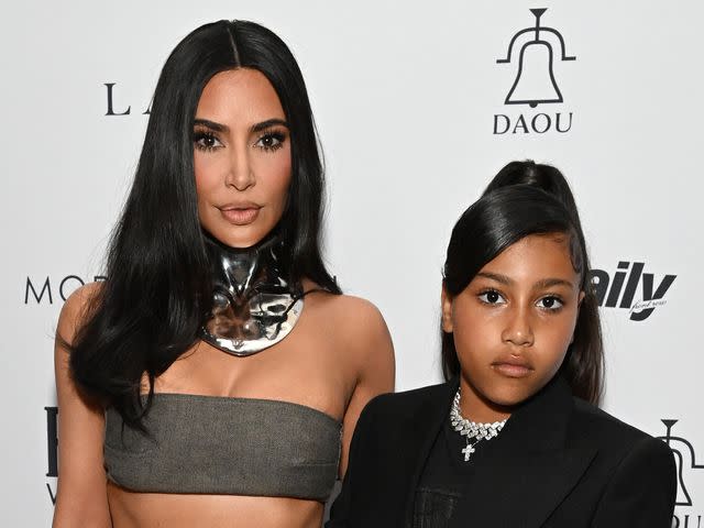 <p>Michael Kovac/Getty</p> Kim Kardashian and daughter North West.