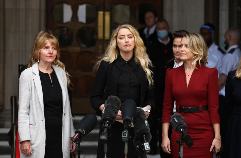 Amber Heard speaks outside the High Court in London after the libel battle between Johnny Depp and News Group Newspapers. (PA/Getty)