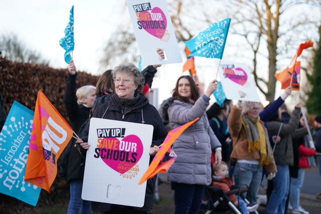 Members of the National Education Union (NEU), on the picket line outside Myton School in Warwick, as tens of thousands of teachers across the UK on Wednesday