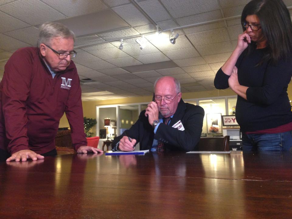 Then-Mishawaka Superintendent Dean Speicher and board members Jeff Emmons and Holly Parks take results for the Mishawaka schools referendum in 2016.