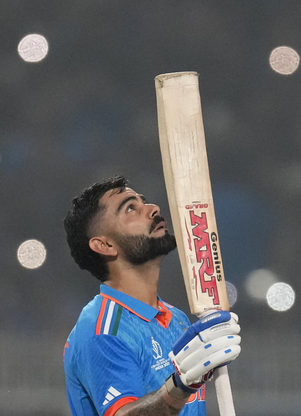 India's Virat Kohli celebrates his century during the ICC Men's Cricket World Cup match between India and South Africa in Kolkata, India, Sunday, Nov. 5, 2023. (AP Photo/Bikas Das)