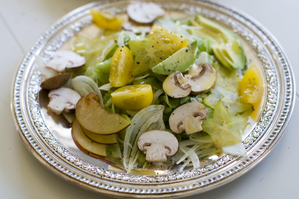 This Nov. 11, 2013 photo shows have-it-your-way celery salad in Concord, N.H. The humble celery stalk - high in fiber and low in calories - provides the foundation for this crunchy salad. Add a lemon vinaigrette, thin ribbons of real Parmigiano-Reggiano cheese and the add-ins of your choice to tailor the dish to your taste. (AP Photo/Matthew Mead)