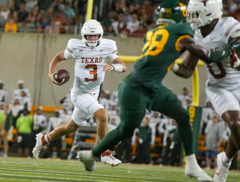Texas quarterback Quinn Ewers had a rushing touchdown and threw for another score against Baylor in the last Big 12 game played between the longtime rivals.