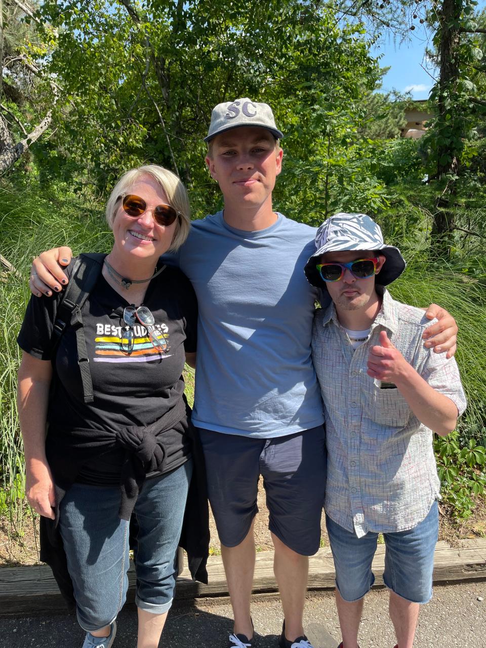 Kristin Schoonveld with biological son Parker Erickson (middle) and adopted son Nick Schoonveld.