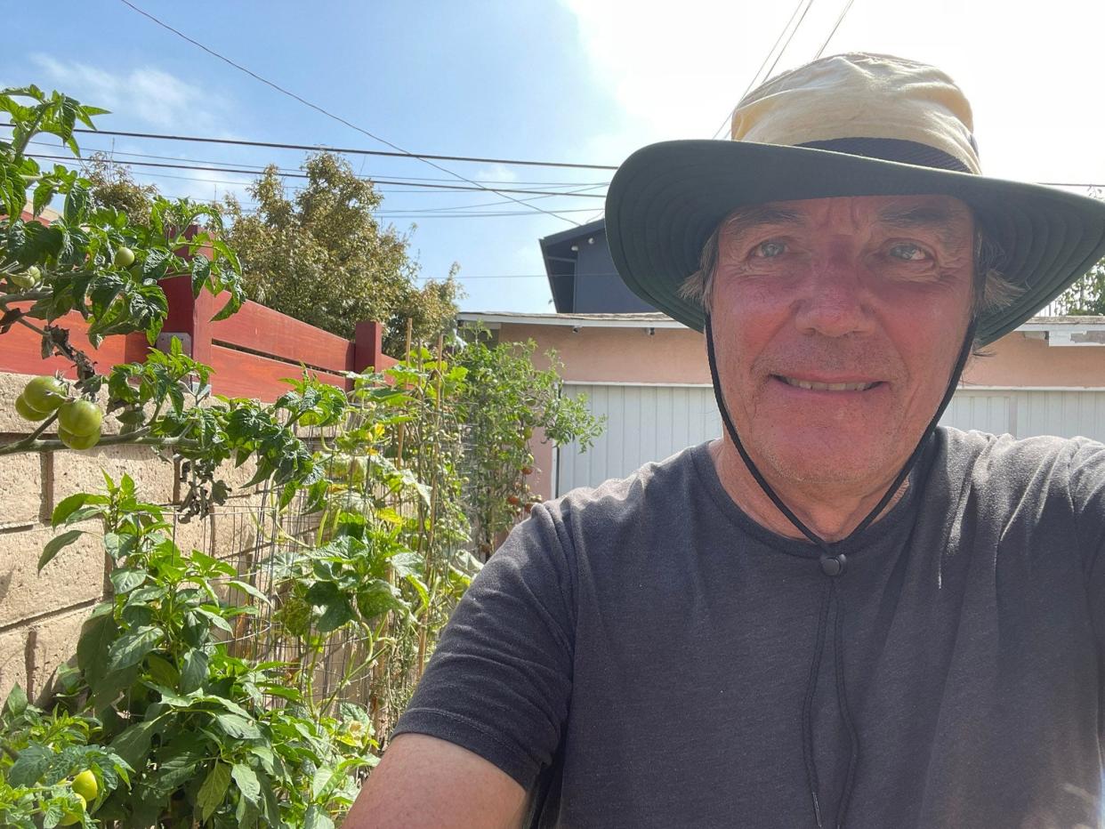 Photograph of Jim Perkins with his allotment.