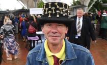 <p>Pictured: Punters brave wild weather as Melbourne Cup festivities get underway</p>