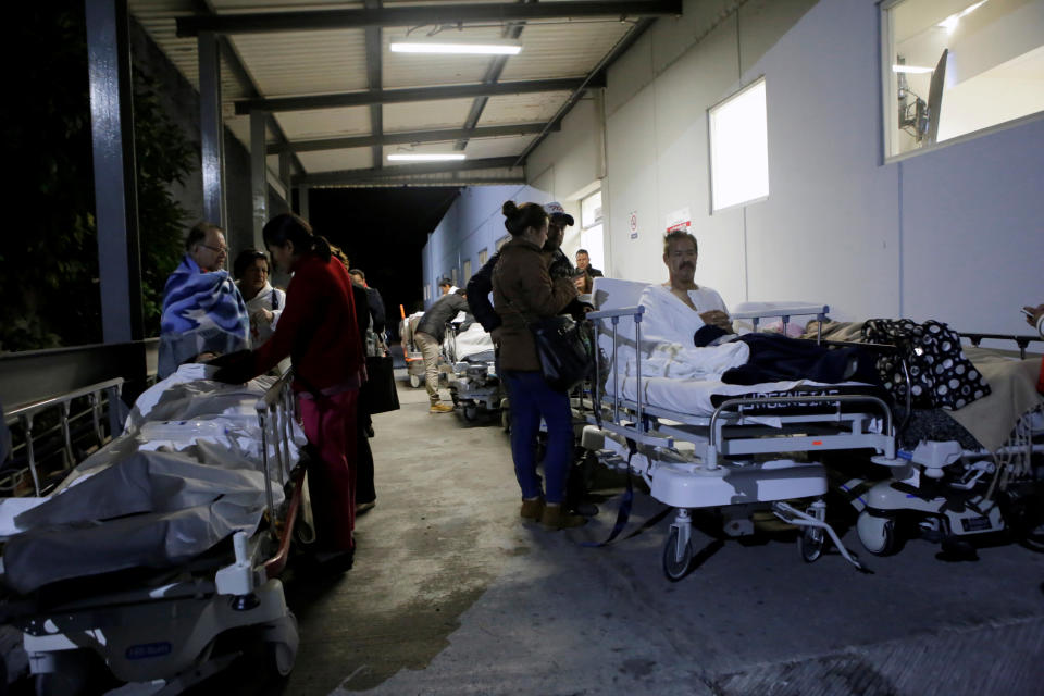 Patients and family members outside the Institute for Social Security and Services for State Workers in Puebla, Mexico, after an earthquake struck off the southern coast of Mexico late on Thursday, September 8.