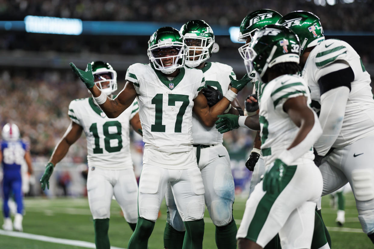 Garrett Wilson (17) and the New York Jets will switch to a uniform that is modeled after the team's 1980s look, which they wore in throwbacks last season. (Photo by Ryan Kang/Getty Images)