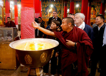 FILE PHOTO: U.S. Ambassador to China Terry Branstad visits Tibet Autonomous Region, China, in this May 22, 2019 handout picture provided by the U.S. Mission to China. U.S. Mission to China/Handout via REUTERS