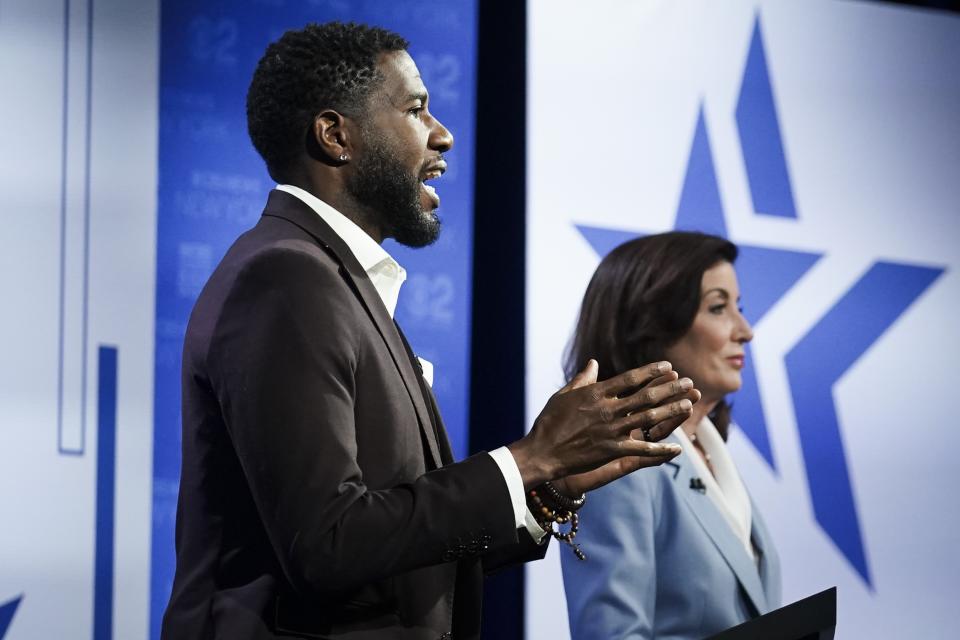 New York Governor Kathy Hochul, left, listens as New York Public Advocate Jumaane Williams, left, speaks during New York's governor primary debate at the studios of WCBS2-TV, June 7, 2022, in New York. (AP Photo/Bebeto Matthews)