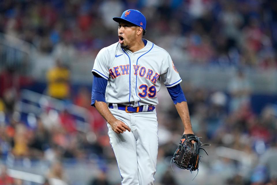 New York Mets relief pitcher Edwin Diaz (39) reacts after getting the final out in the ninth inning of a baseball game against the Miami Marlins, Saturday, June 25, 2022, in Miami.
