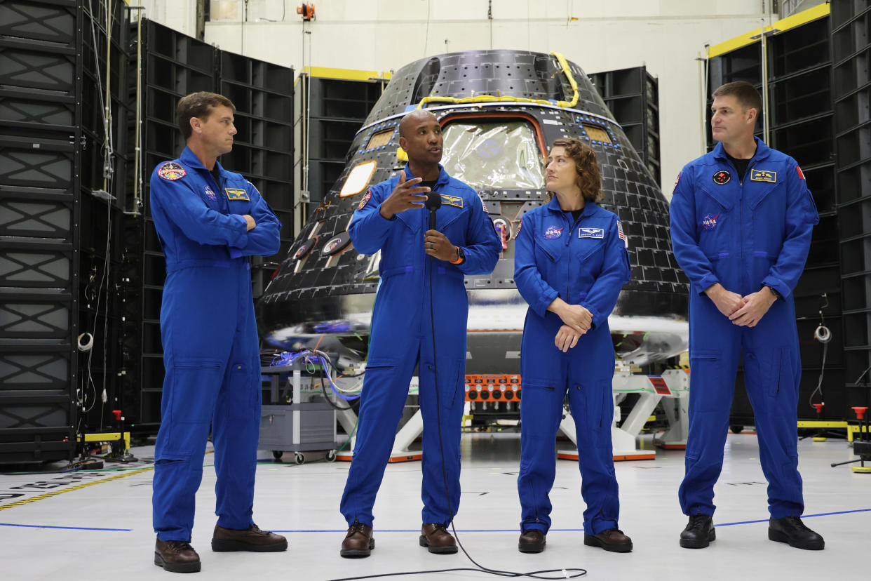 From left to right: Artemis II Astronauts: Commander Reid Wiseman; Pilot Victor Glover; and Mission Specialists Christina Hammock Koch; and Jeremy Hansen; in front of the Artemis II Crew Module during Orion Media Day at Kennedy Space Center, on Tuesday, Aug. 8, 2023. (Ricardo Ramirez Buxeda/Orlando Sentinel/Tribune News Service via Getty Images)