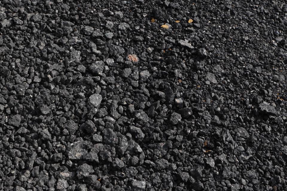 A close-up of the RAP – a mix of fine milling and chunks of old pavement – covers a road located within Neskonlith Indian Reserve number two on May 15. Photo by Aaron Hemens