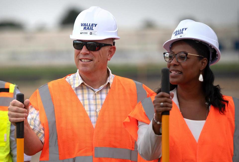 Stanislaus County Supervisor Vito Chiesa, left, and Tracy Mayor Nancy Young pose for a picture during a ceremonial ground-breaking for culvert installation project for the ACE train in Lathrop, Calif., Tuesday, June 18, 2024.