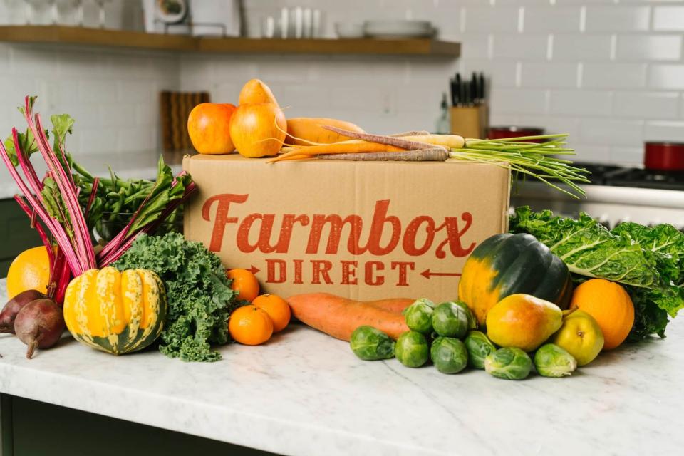 Fruit Delivery Service, fruits and veggies around a farmbox direct shipping box