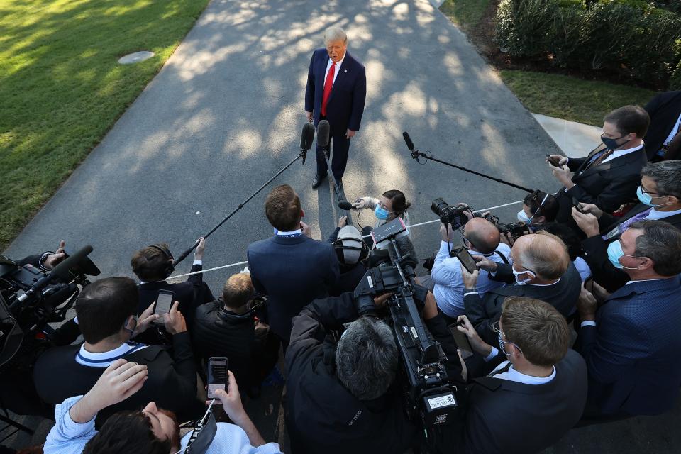 U.S. President Donald Trump talks to reporters as he departs the White House September 21, 2020 in Washington, DC. Trump is traveling to Ohio for a campaign event.