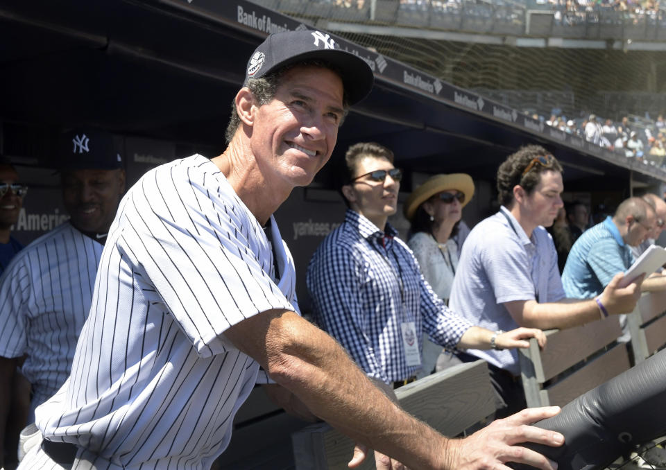 FILE - New York Yankees' Paul O'Neill waits to be introduced at the Yankees Old Timers' Day baseball game Sunday, June 17, 2018, at Yankee Stadium in New York. O'Neill's No. 21 will be retired by the New York Yankees — on Aug. 21. The Yankees said Tuesday, Feb. 22, 2022, that they will hold Paul O'Neill Day ceremonies before that day's game against Toronto _ assuming the lockout ends and the 2022 season is played. (AP Photo/Bill Kostroun, File)