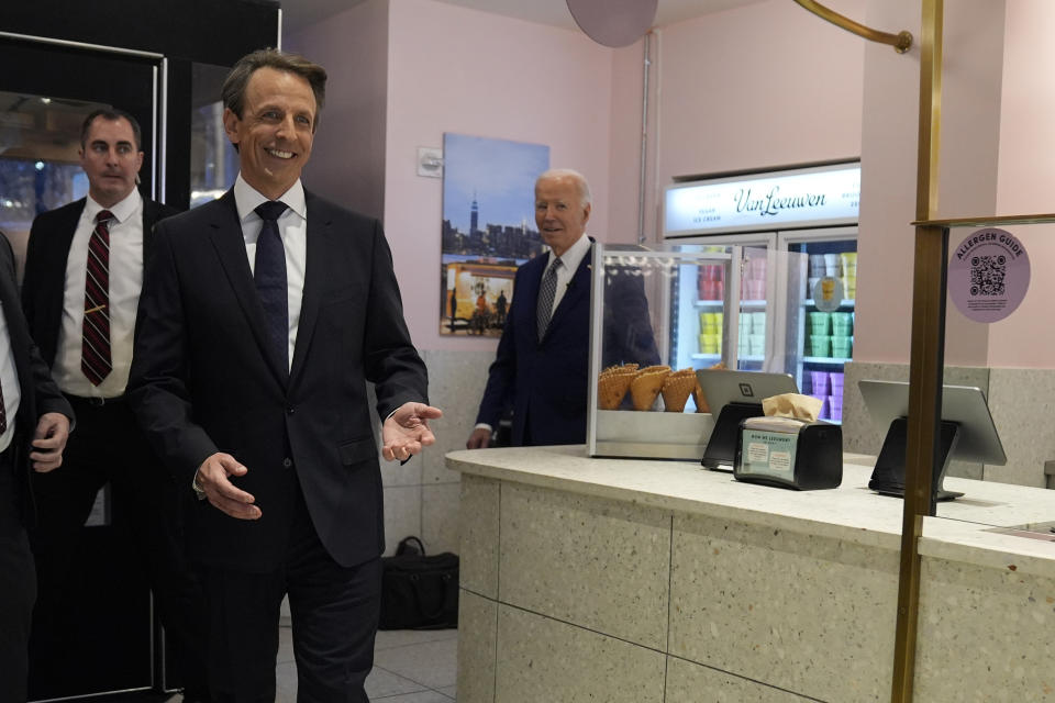 President Joe Biden arrives with Seth Meyers, front, at Van Leeuwen Ice Cream Monday, Feb. 26, 2024, in New York. (AP Photo/Evan Vucci)