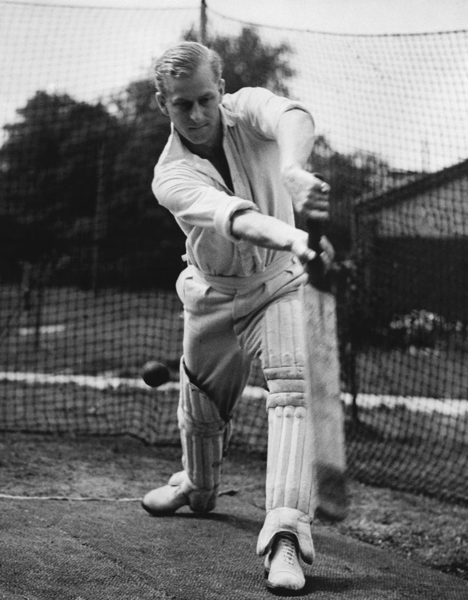 FILE - In this July 31, 1947 file photo, Lt. Philip Mountbatten, whose marriage to Princess Elizabeth has been set for November 20, bats at the nets during cricket practice at the Petty Officers' Training Center, Corsham, England. Buckingham Palace says Prince Philip, husband of Queen Elizabeth II, has died aged 99. (AP Photo/File)