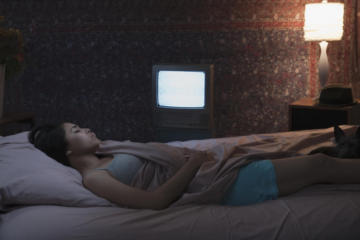 A new study has linked sleeping with the light or TV on and weight gain [Photo: Getty]