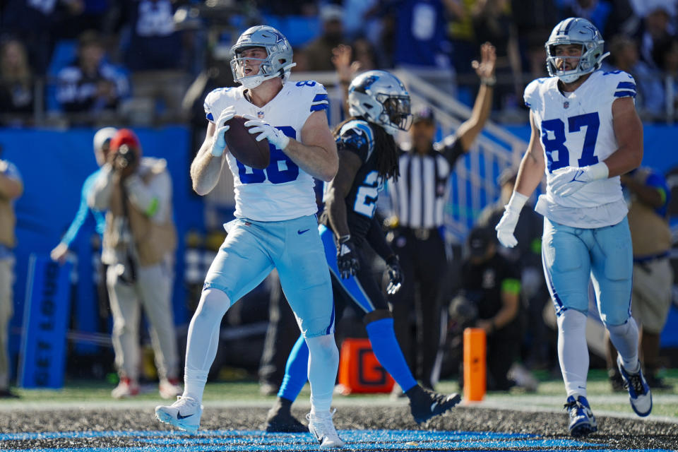 Dallas Cowboys tight end Luke Schoonmaker celebrates after scoring against the Carolina Panthers during the first half of an NFL football game Sunday, Nov. 19, 2023, in Charlotte, N.C. (AP Photo/Rusty Jones)