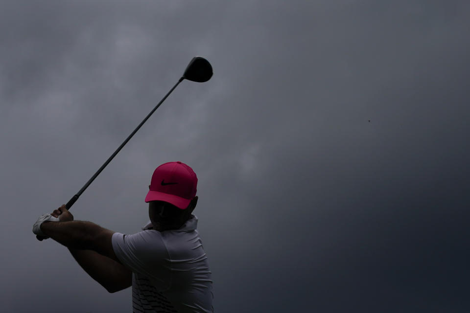 Brooks Koepka tees off on the 18th hole during the second round of the Masters golf tournament on Friday, April 9, 2021, in Augusta, Ga. (AP Photo/Charlie Riedel)