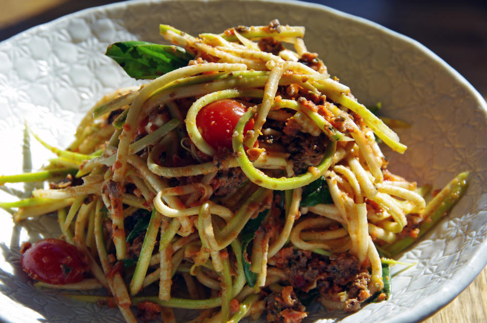 Fresh zucchini spaghetti with walnut and mushroom Bolognese