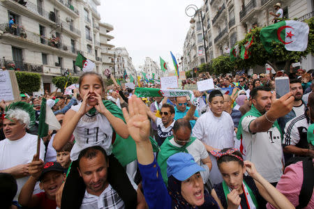 Demonstrators chant slogans during a protest to demand the postponement of a presidential election and the removal of the ruling elite in Algiers, Algeria May 24, 2019. REUTERS/Ramzi Boudina