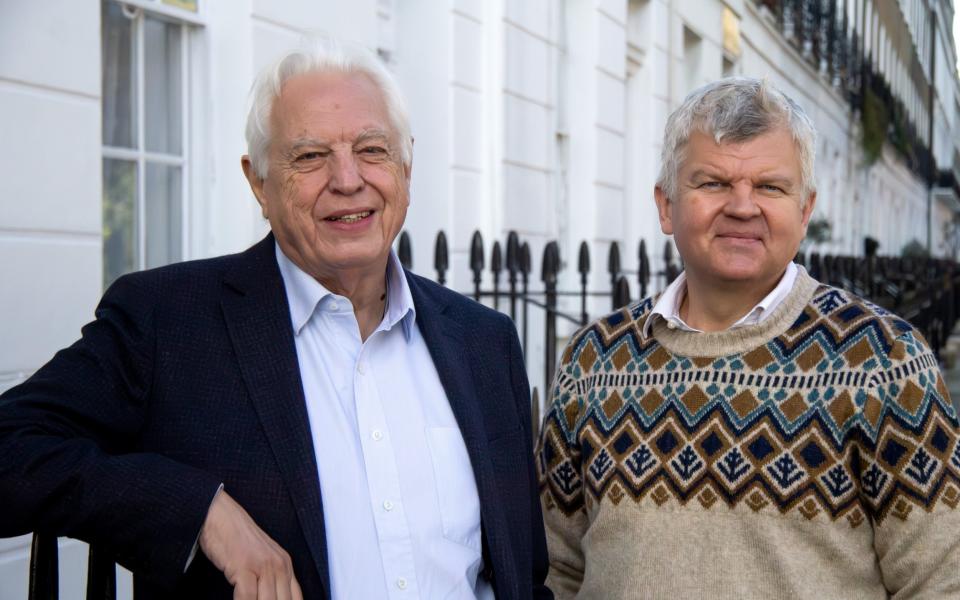 John Simpson and Adrian Chiles standing together on London street