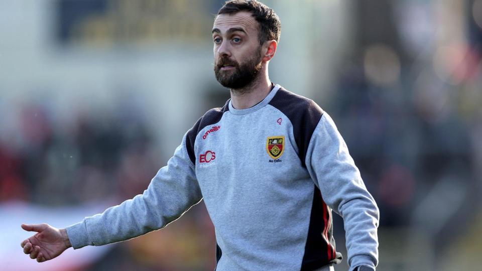 Conor Laverty gives instructions to his Down players during the Ulster semi-final at Clones